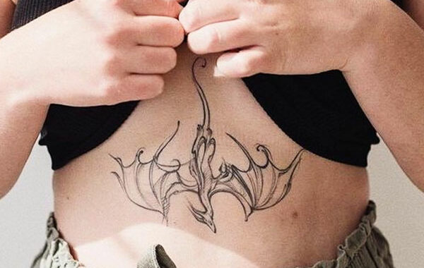sternum dragon tattoo