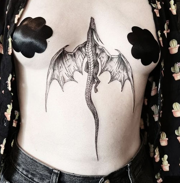 sternum tattoo design dragon